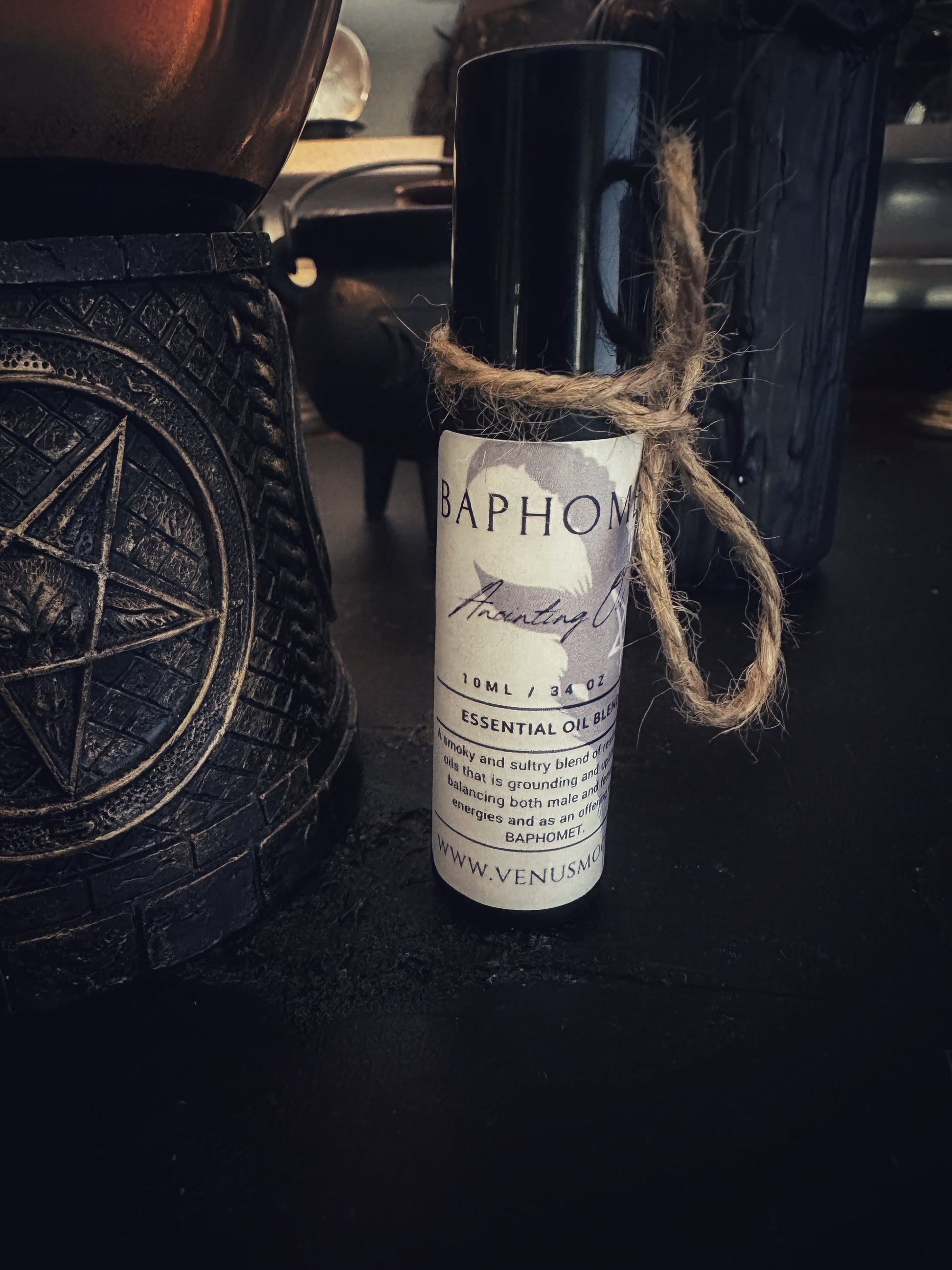Baphomet Anointing Oil in 10ml glass roller bottle, a dark ritual oil honoring balance, alchemy, and hidden wisdom.