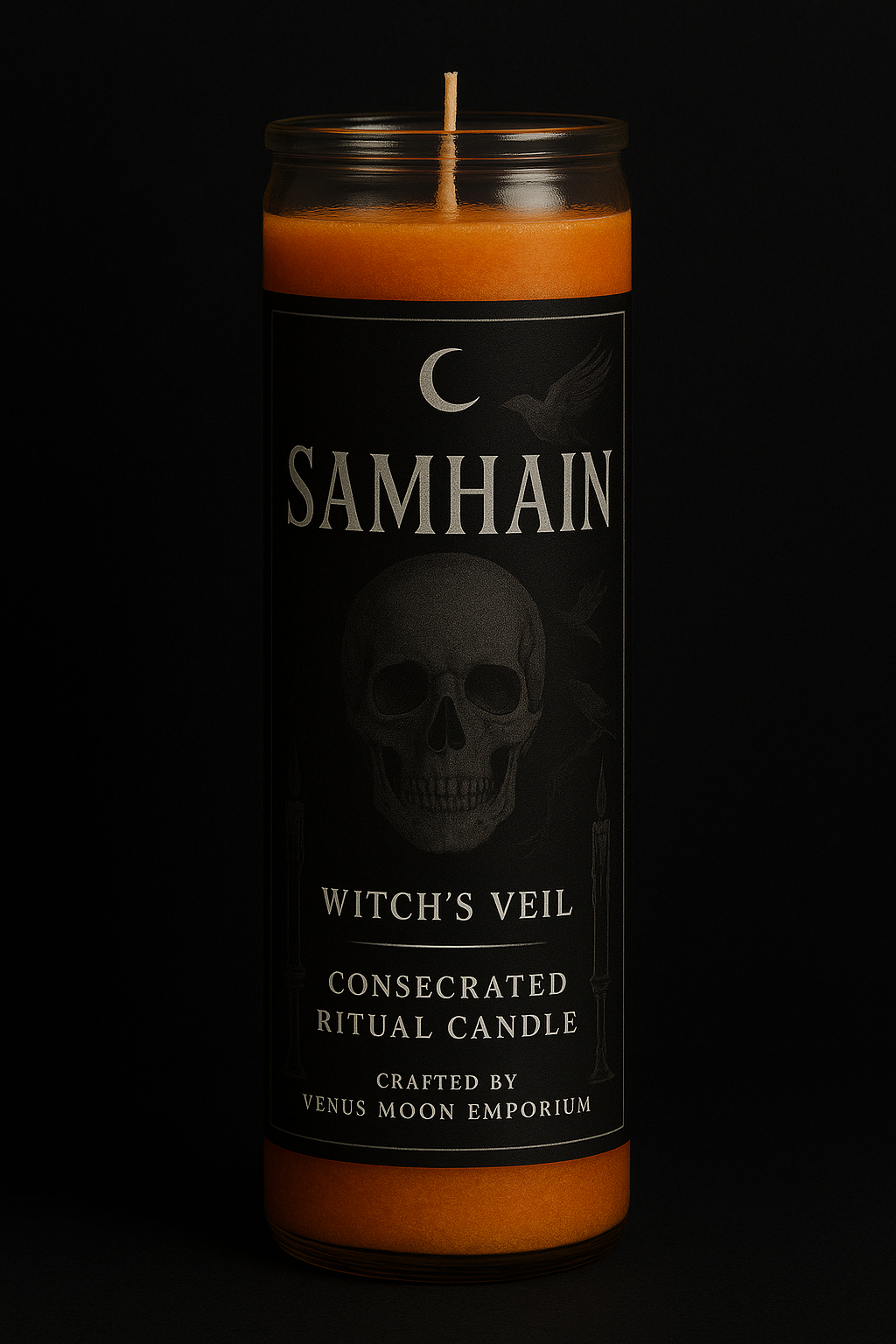 A dark, moody Samhain candle labeled Witch’s Veil glows softly against a black background, its orange wax embodying fire, remembrance, and the thinning veil between worlds.