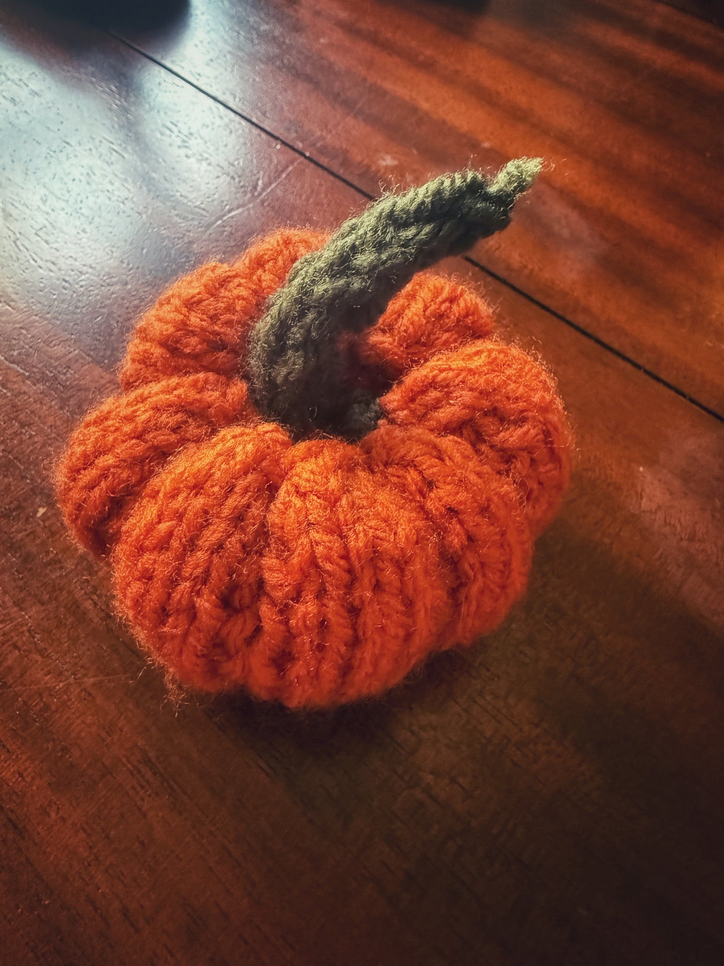 Orange knit pumpkin, handmade Halloween and Thanksgiving home décor.