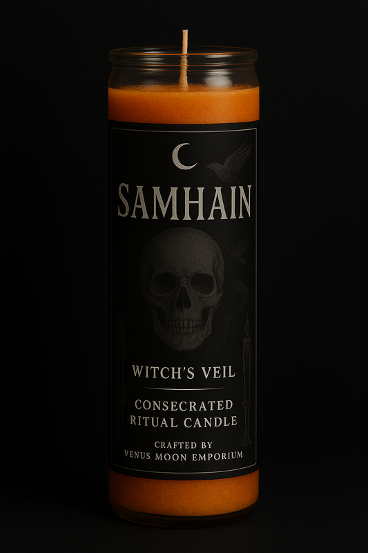 A dark, moody Samhain candle labeled Witch’s Veil glows softly against a black background, its orange wax embodying fire, remembrance, and the thinning veil between worlds.